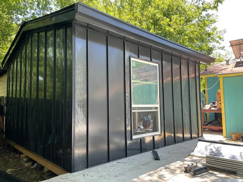 Black standing seam metal wall panels for Metal Roof Installation in Zachary