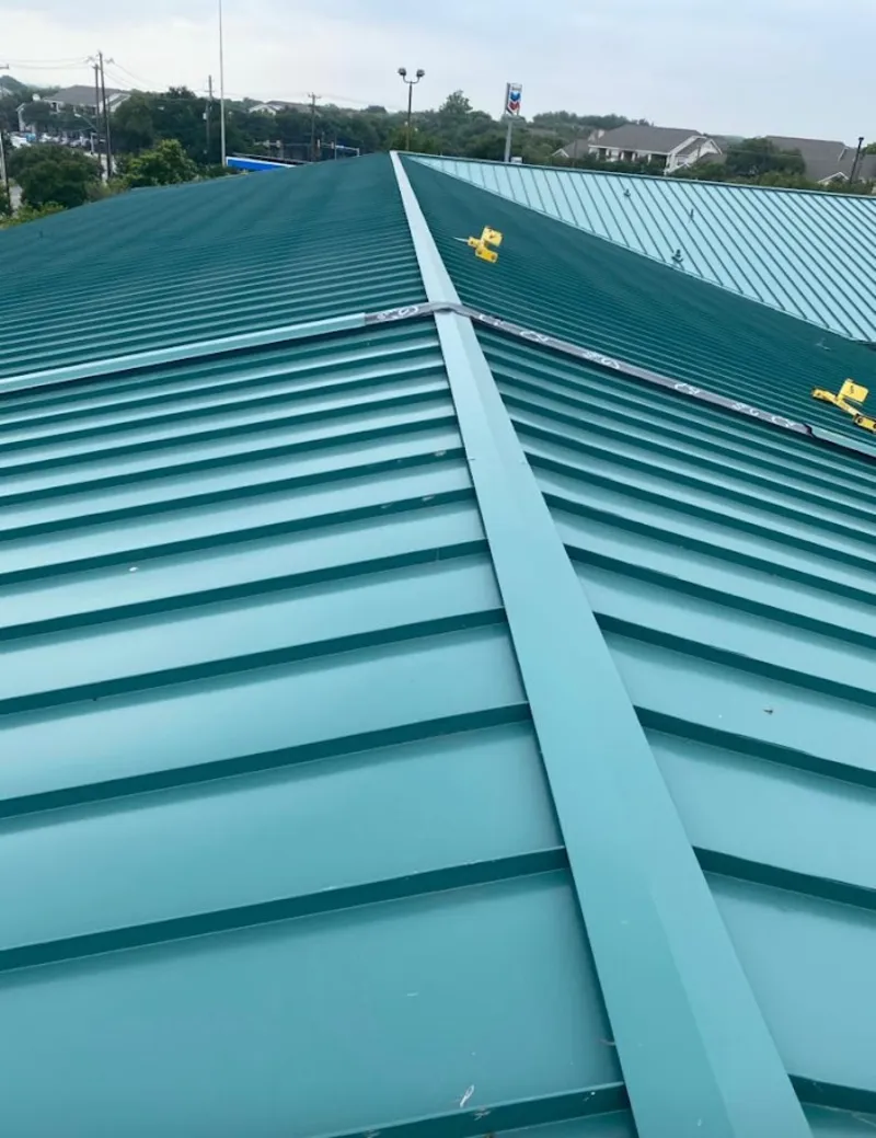 Green commercial metal roof ridge and valley for Metal Roof Repair in Zachary